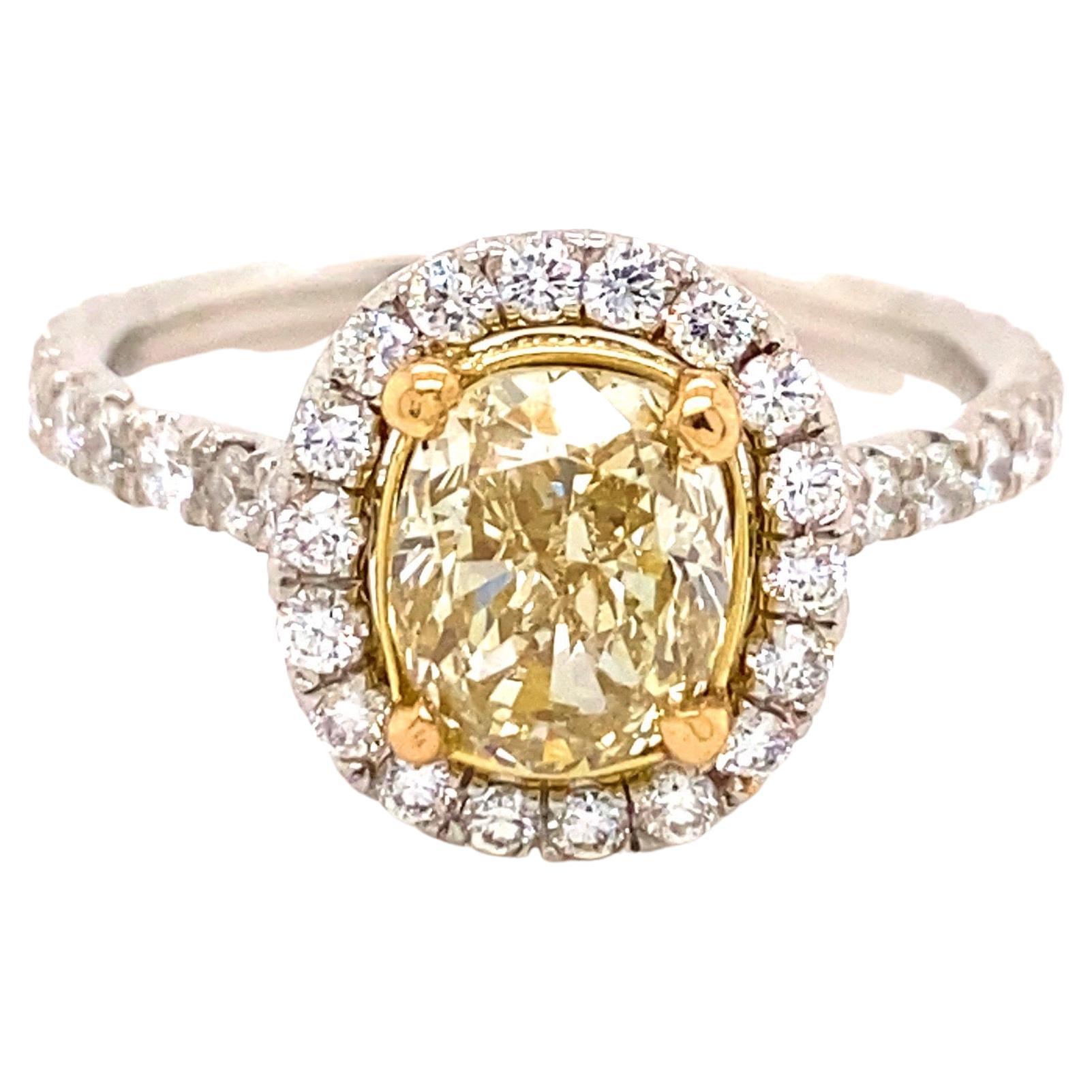 Natural Light Fancy Yellow Oval 2.39 Tcw Platinum Engagement Ring For Sale