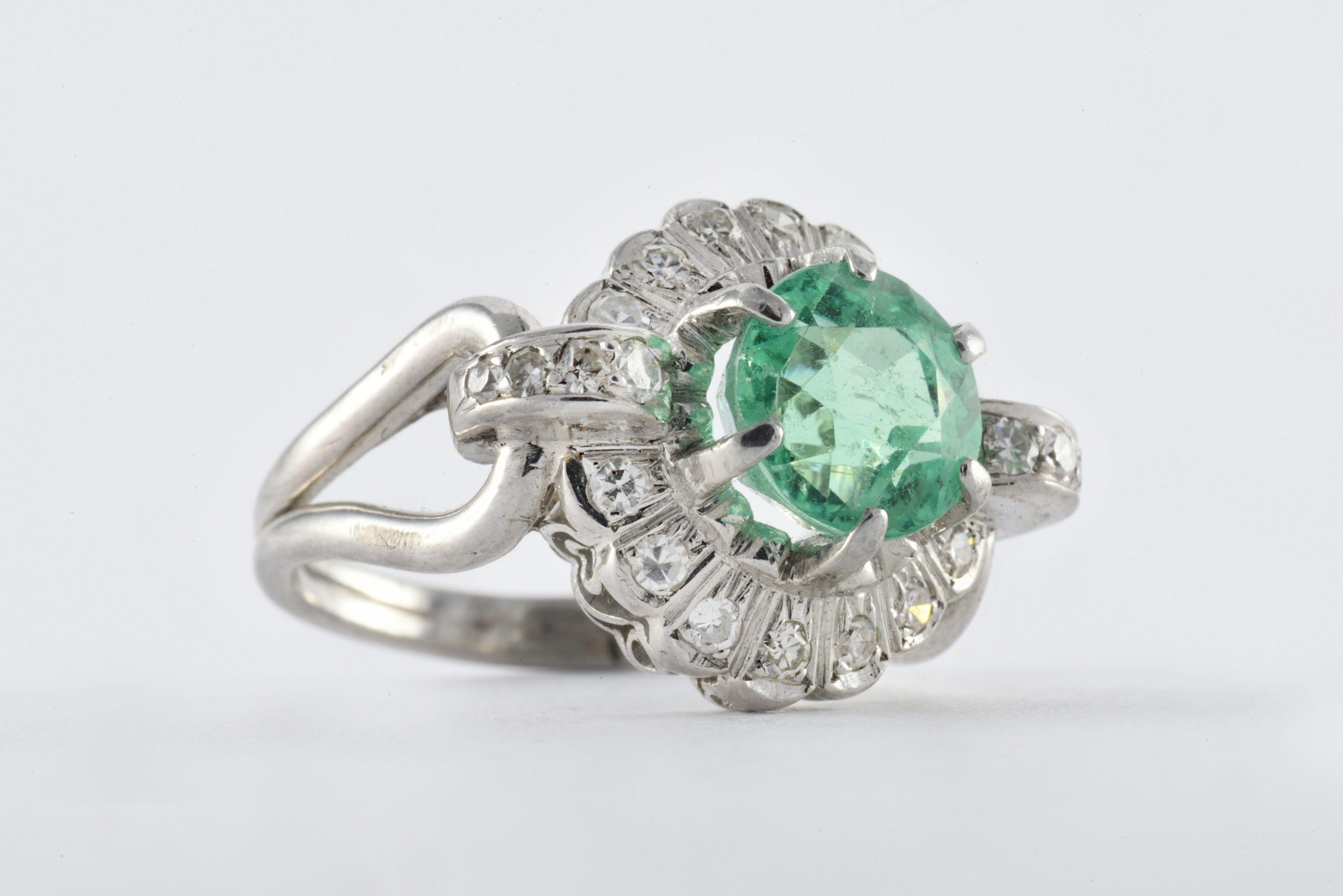light green emerald engagement ring