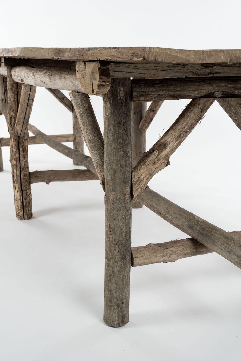 Hand-Carved Natural Live-Edge Rectangular-Shape Table Raised Upon Rustic Wooden Trestle Base For Sale