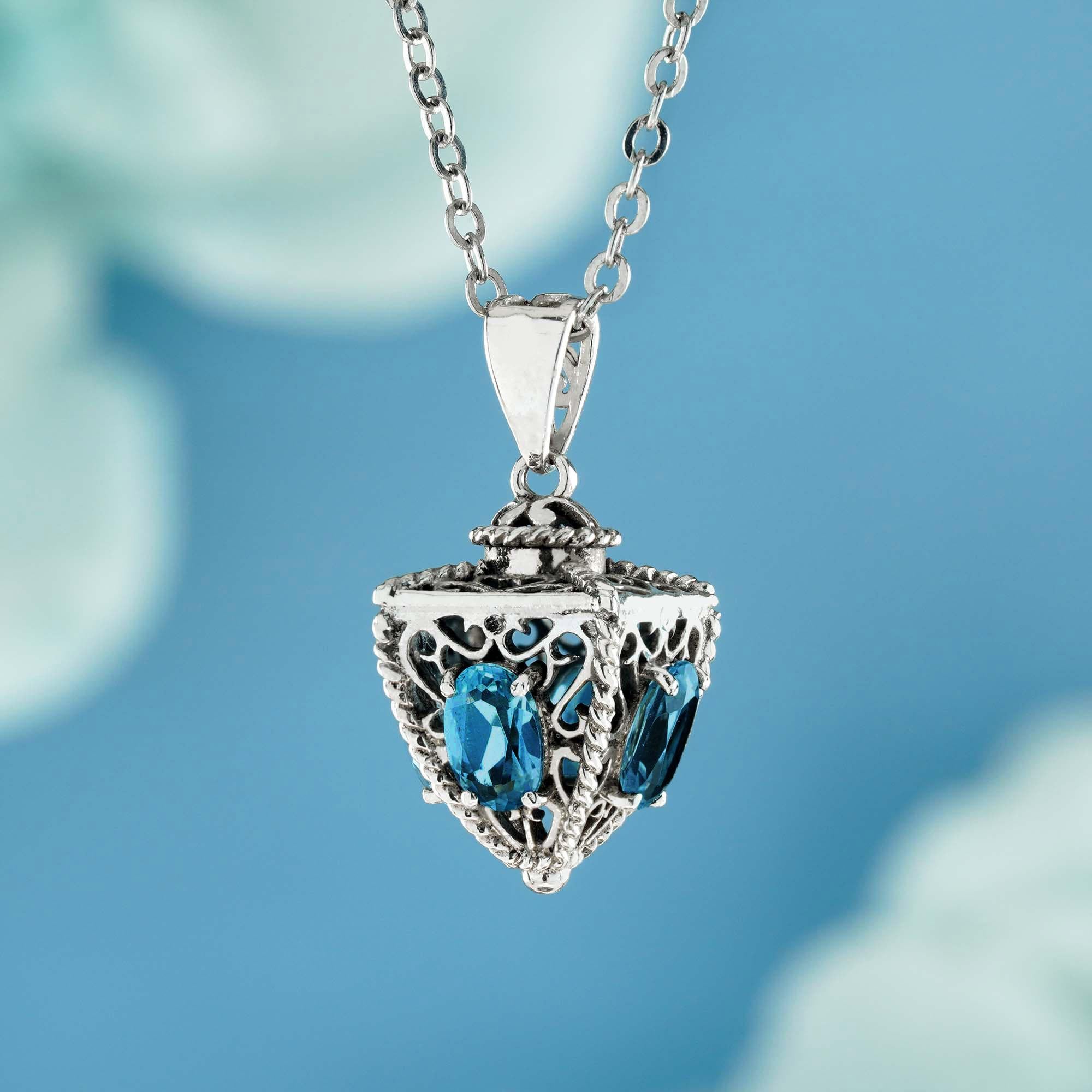 Oval Cut Natural London Blue Topaz Pyramid Shape Vintage Style Pendant in 9K White Gold For Sale