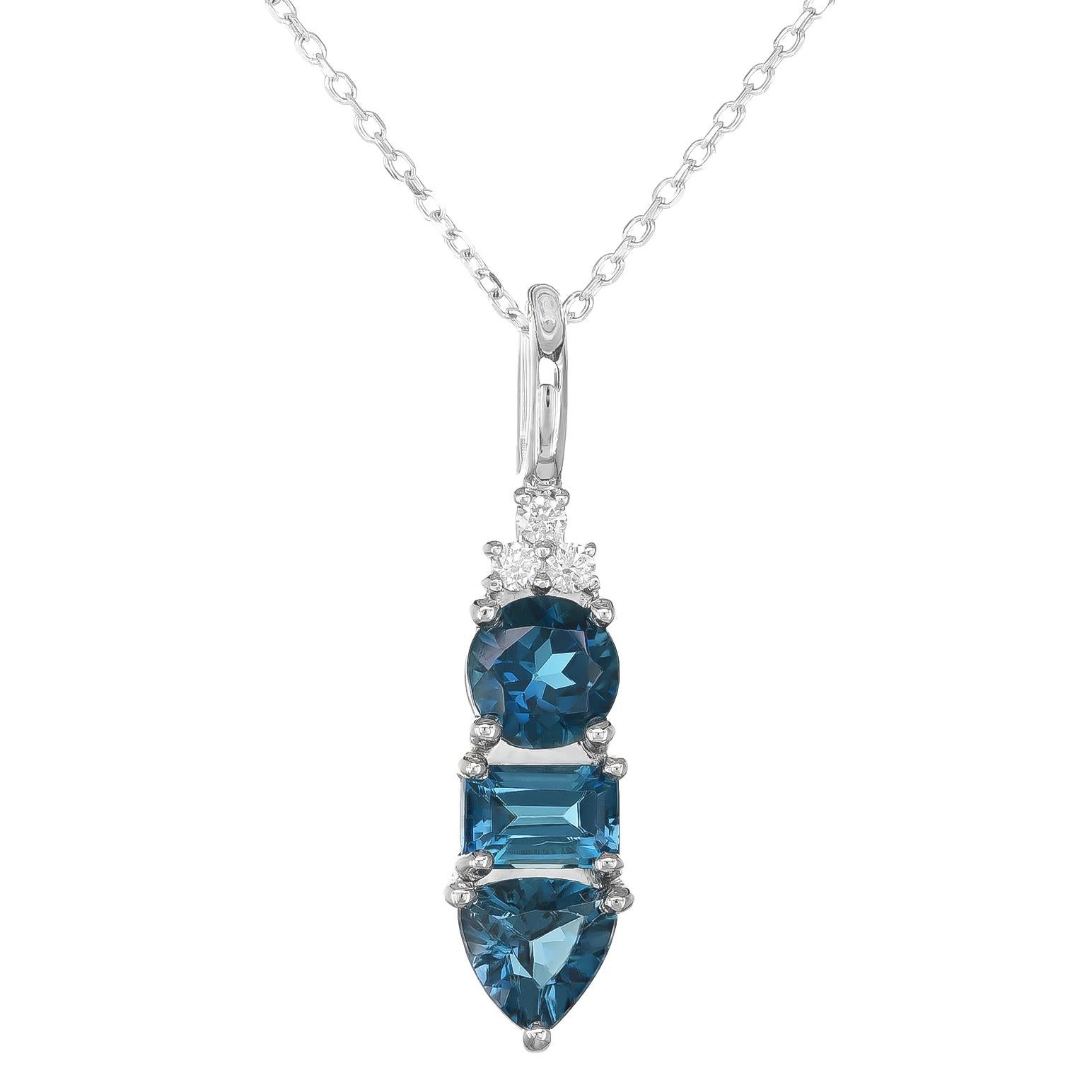 Discover the captivating elegance of natural London blue topaz with this stunning pendant, beautifully set in 14K white gold. Complemented by sparkling diamonds, this piece showcases exceptional craftsmanship and the enchanting beauty of these