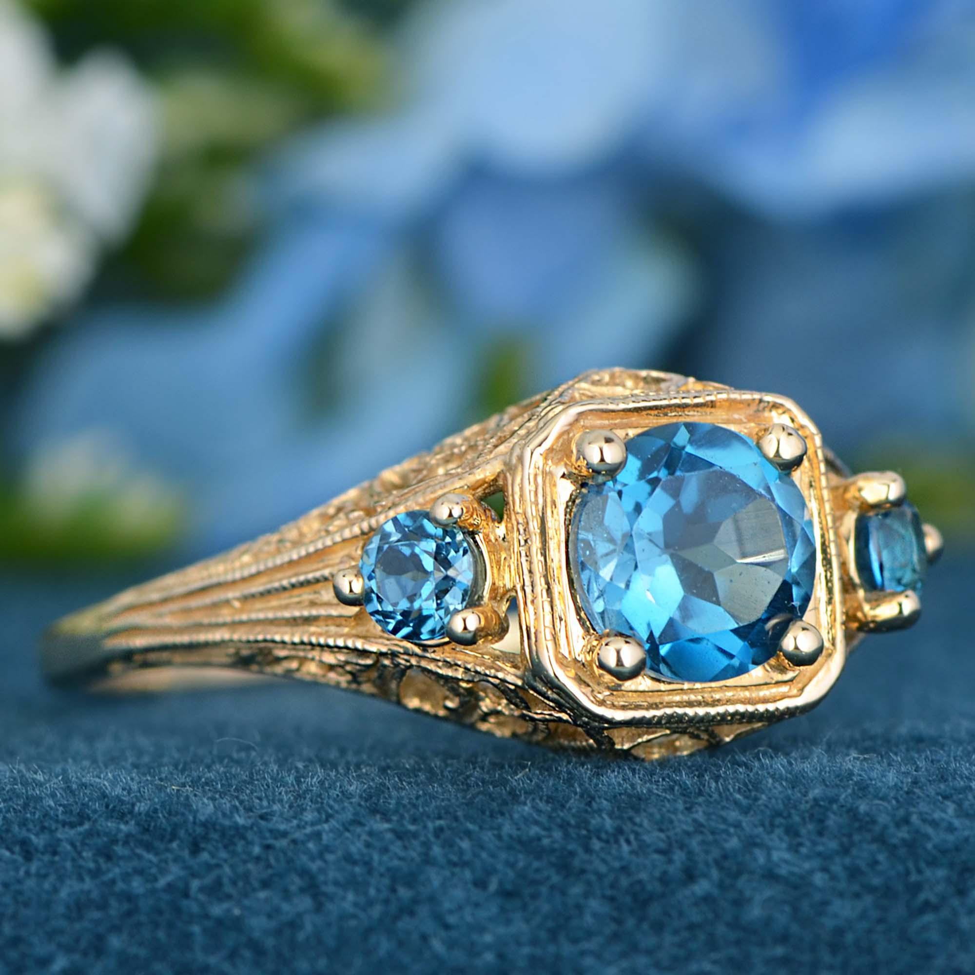 For Sale:  Natural London Blue Topaz Vintage Style Filigree Three Stone Ring in 9K Gold 3