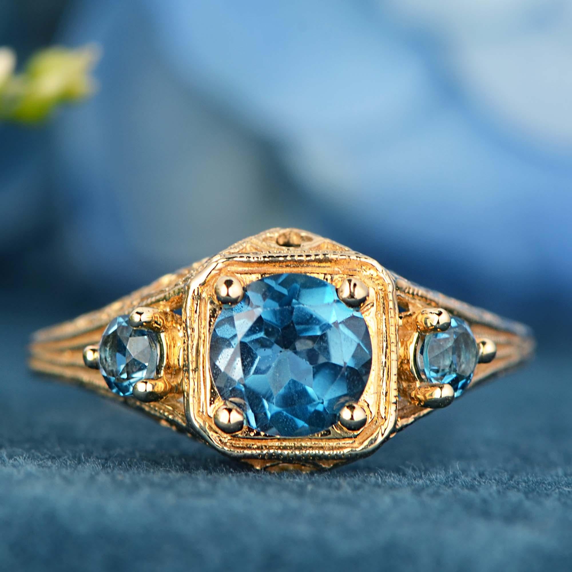 For Sale:  Natural London Blue Topaz Vintage Style Filigree Three Stone Ring in 9K Gold 2