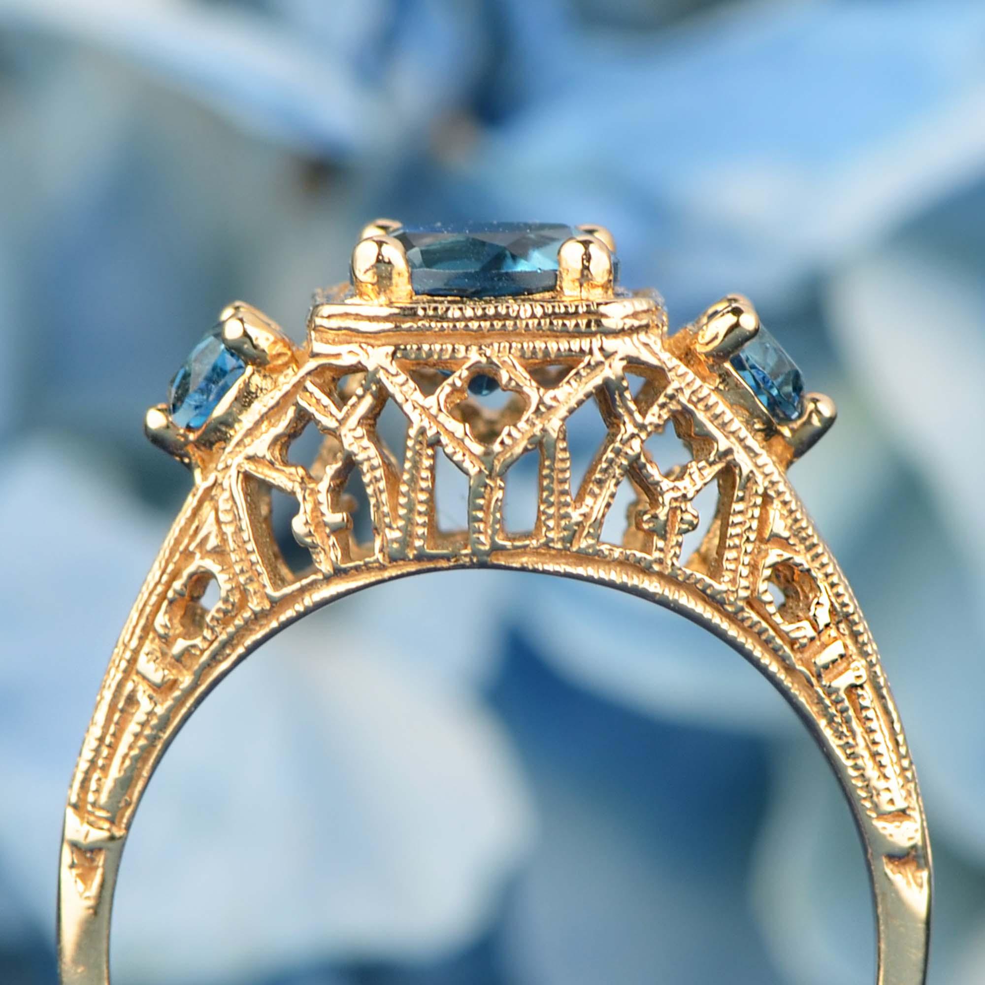 For Sale:  Natural London Blue Topaz Vintage Style Filigree Three Stone Ring in 9K Gold 5