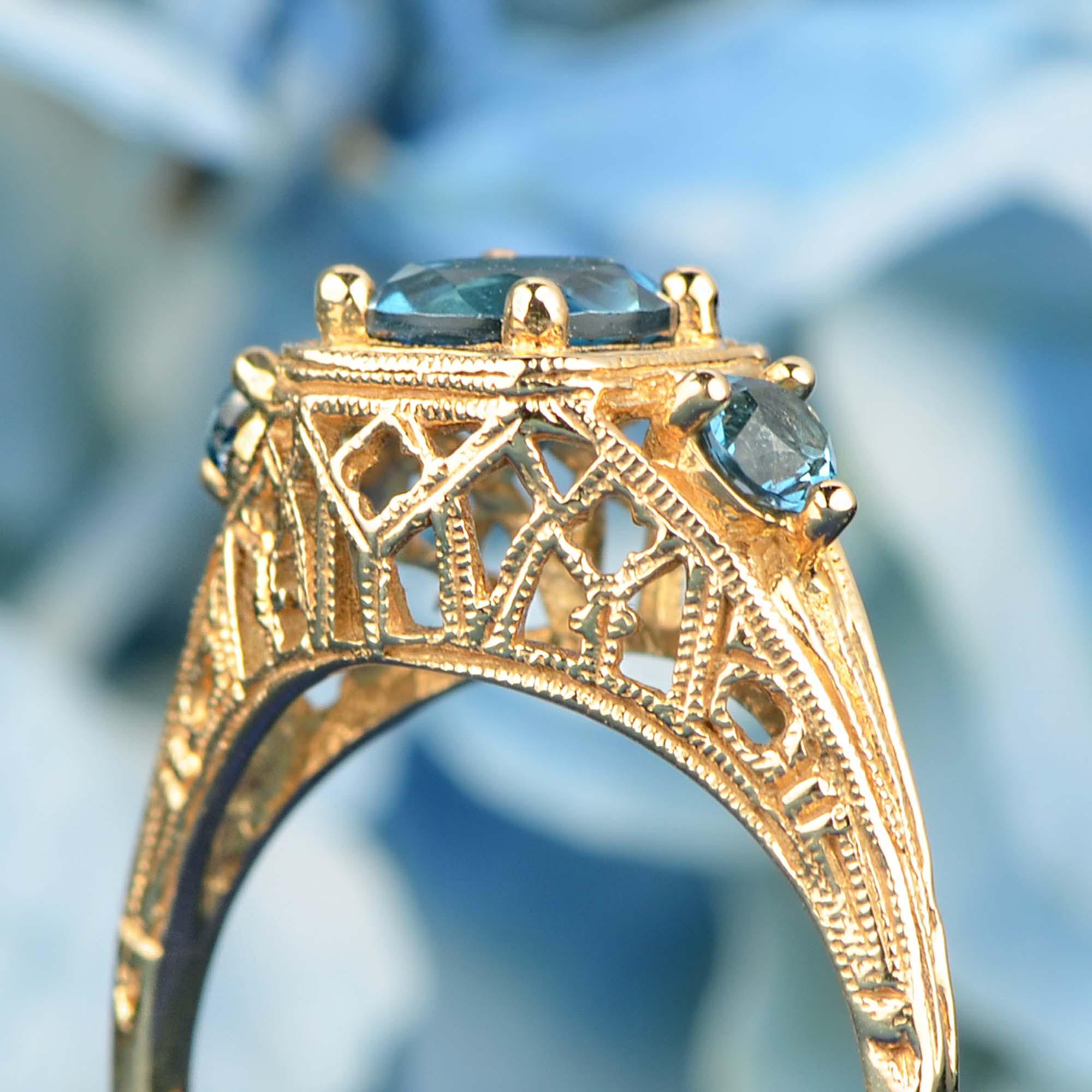 For Sale:  Natural London Blue Topaz Vintage Style Filigree Three Stone Ring in 9K Gold 6