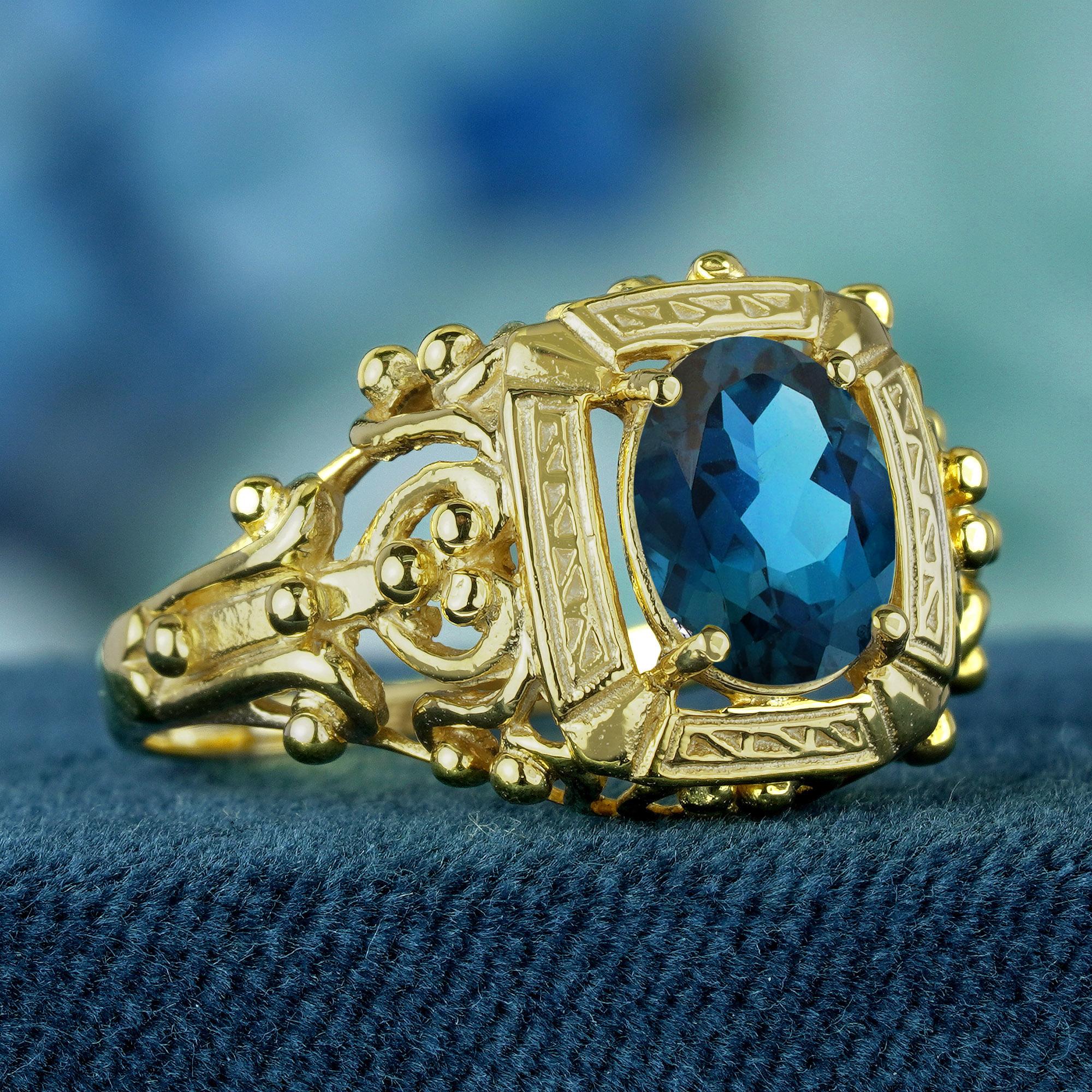 Elevate your jewelry collection with this natural London blue topaz vintage style filigree ring in solid yellow gold. Expertly crafted with intricate open work filigree, this exquisite ring features a vibrant London blue topaz at its heart, exuding