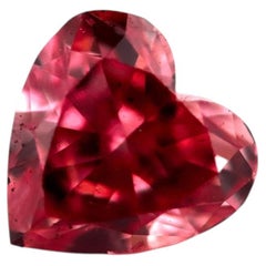 Natural Loose GIA Certified 0.15ct Fancy Orangy Pink Heart Diamond (SI2)