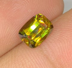 Natural Lustrous Sphene Gemstone: Multi Color Cushion Cut, 2.53 Carat