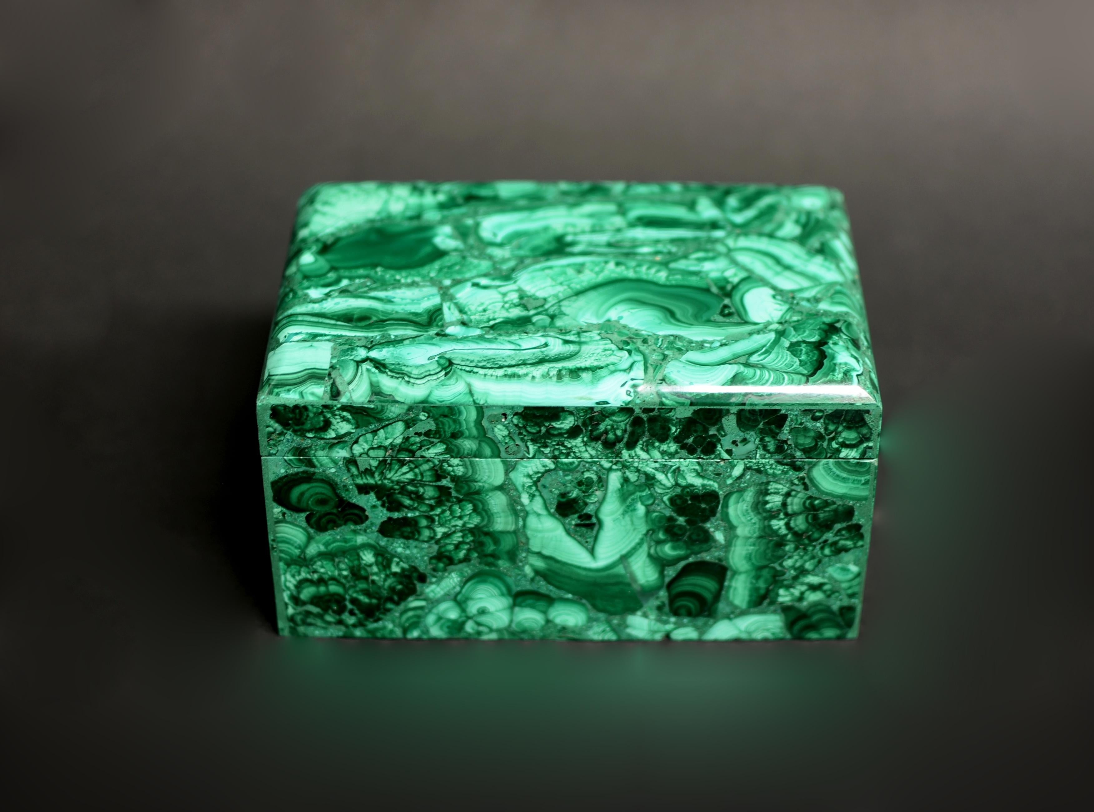 A beautiful 3.3 lb malachite box. This exceptional piece uses carefully selected fine grade gemstone malachite in brilliant green, displaying concentric rings, swirls and stripes. Box is finely crafted and masterfully polished to a lustrous shine. A