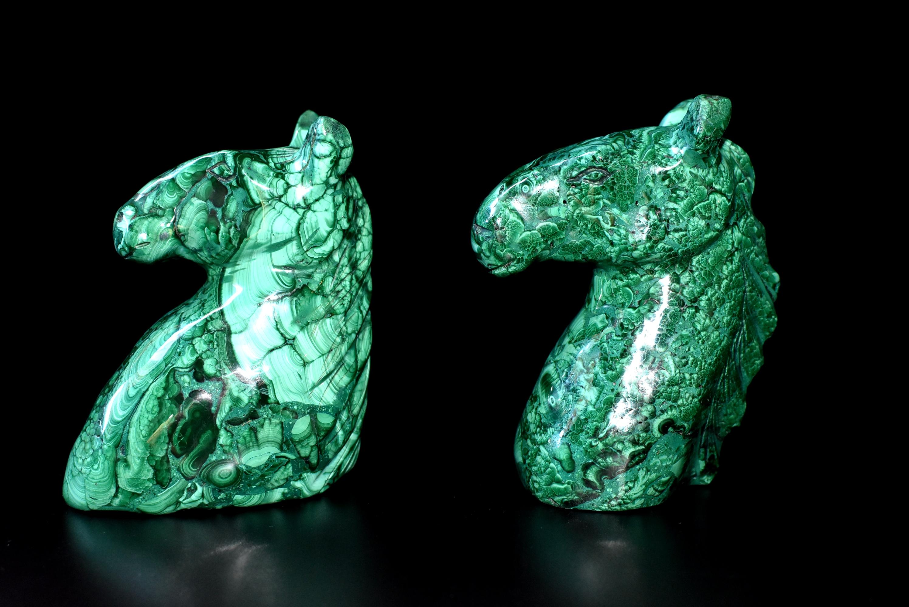 A pair of beautiful horse sculptures in the most spectacular natural malachite. All natural with splendid swirls and patterns, these remarkable pieces make wonderful bookends and paperweights. Malachite is a stone of transformation, helping one
