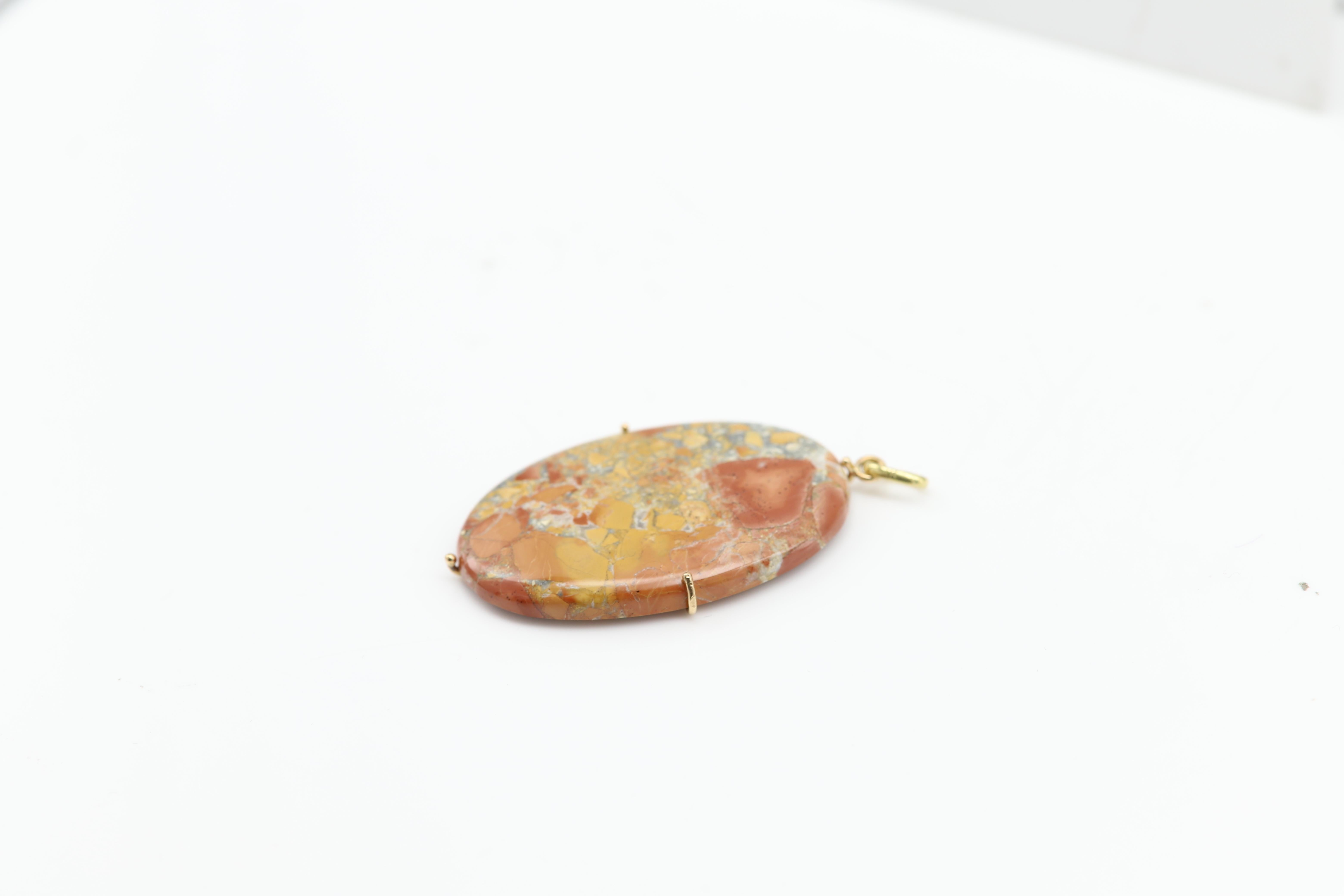 Colorful Maligano Jasper Natural stone Pendant
Set in 14k yellow gold wire.
approx size 1.75' inch Tall (43 x 28 mm) 
basic link Chain 16' Inch.
Bright Brown-Yellow tone oval shape
Origin: Indonesia 
Made in elegant style that the stone is exposed