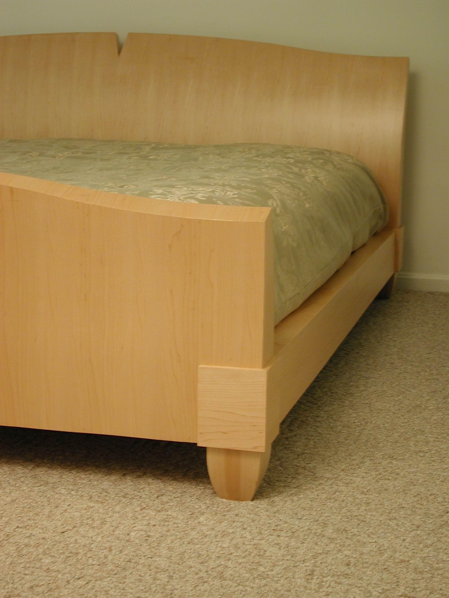 The Antilles Bed is a king sized platform bed and does not require a box spring. It is shown in natural maple open grain finish. The bed can be made to fit a queen sized bed as well other materials. 

All our work is signed, dated, and made to