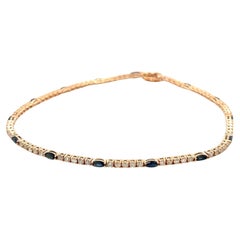 Bracciale tennis con zaffiro blu marquise e diamante rotondo in oro rosa 18 carati Nature
