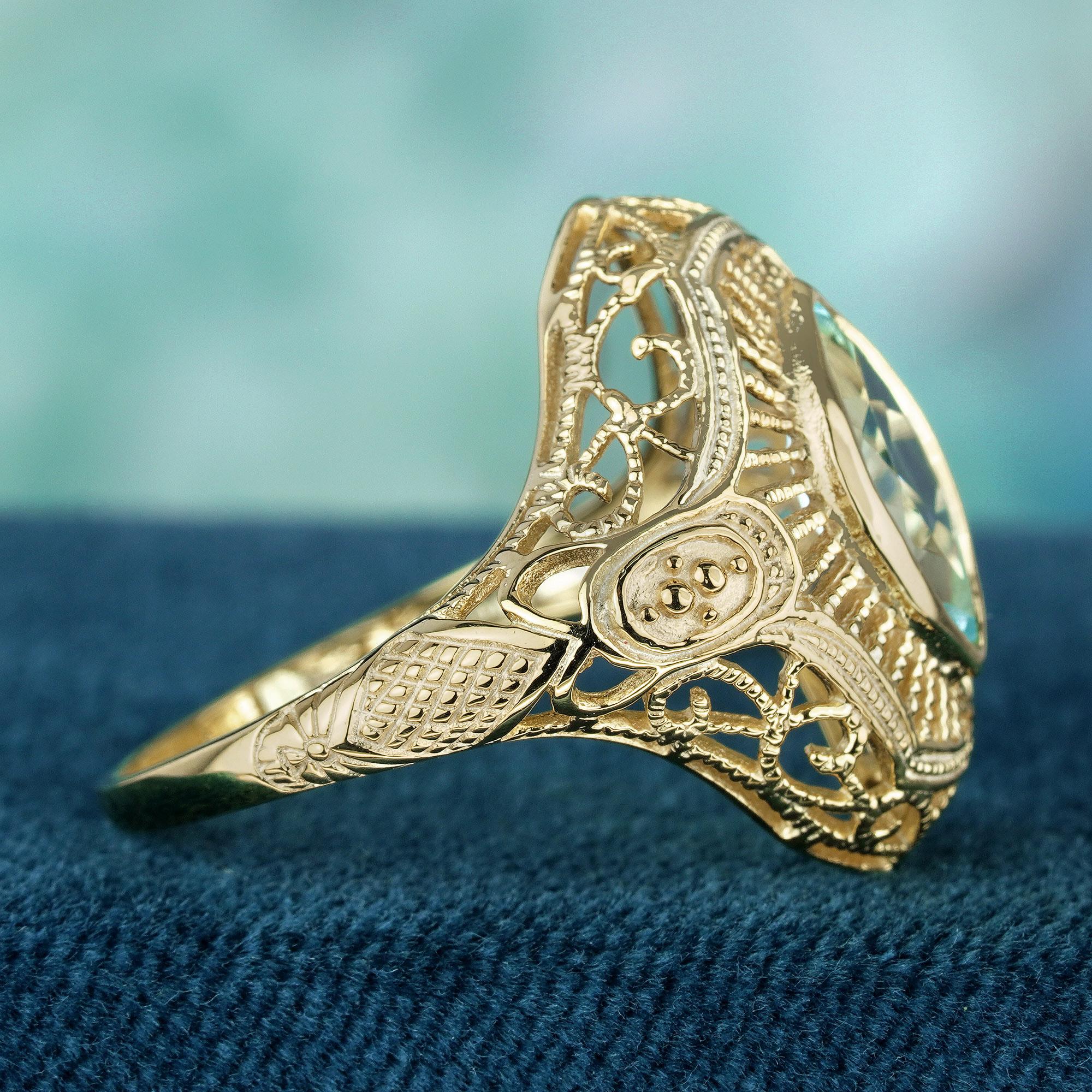 filigraner Ring aus massivem 9 Karat Gelbgold mit natürlichem Marquise-Blauem Topas im Art-déco-Stil (Marquiseschliff) im Angebot