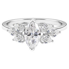 Anello con motivo floreale e diamante naturale a taglio marquise, in oro bianco 18 carati – Gioielleria di alta gamma