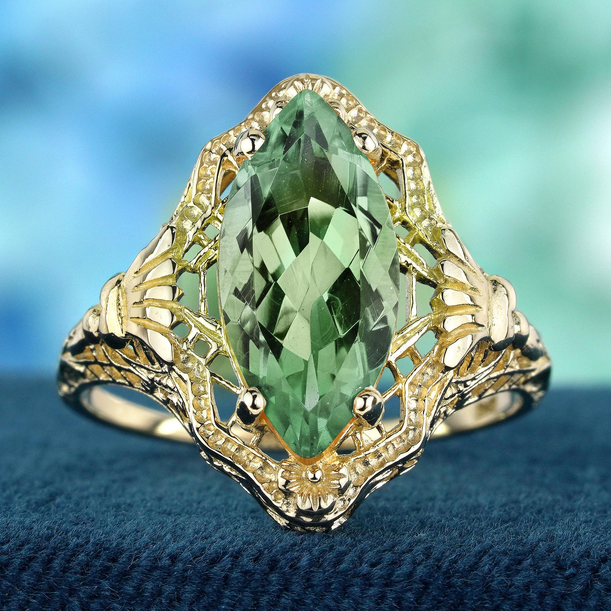 Crea momenti indimenticabili con il nostro anello con filigrana in stile vintage di ametista verde marquise naturale in oro giallo massiccio 9 carati. Questo incantevole anello presenta una splendida ametista verde a forma di marquise, che cattura