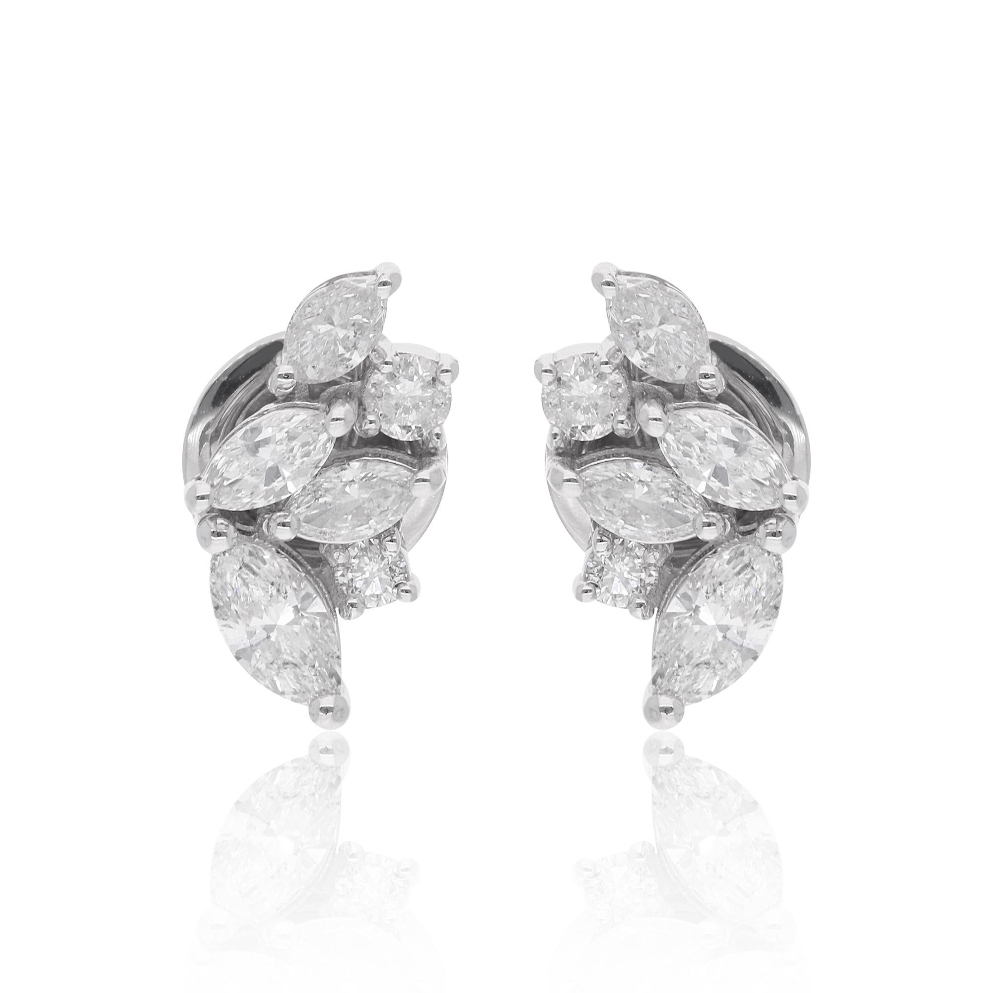 Indulge in the timeless elegance of these Natural Marquise & Round Diamond Stud Earrings, meticulously crafted in luxurious 18 karat white gold. These exquisite earrings are a testament to refined taste and sophistication, featuring a captivating