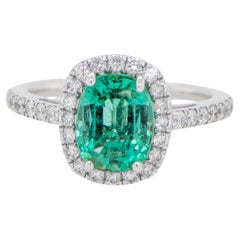 Bague en or 18 carats avec émeraude menthe naturelle sertie d'un halo de diamants de 2,26 carats