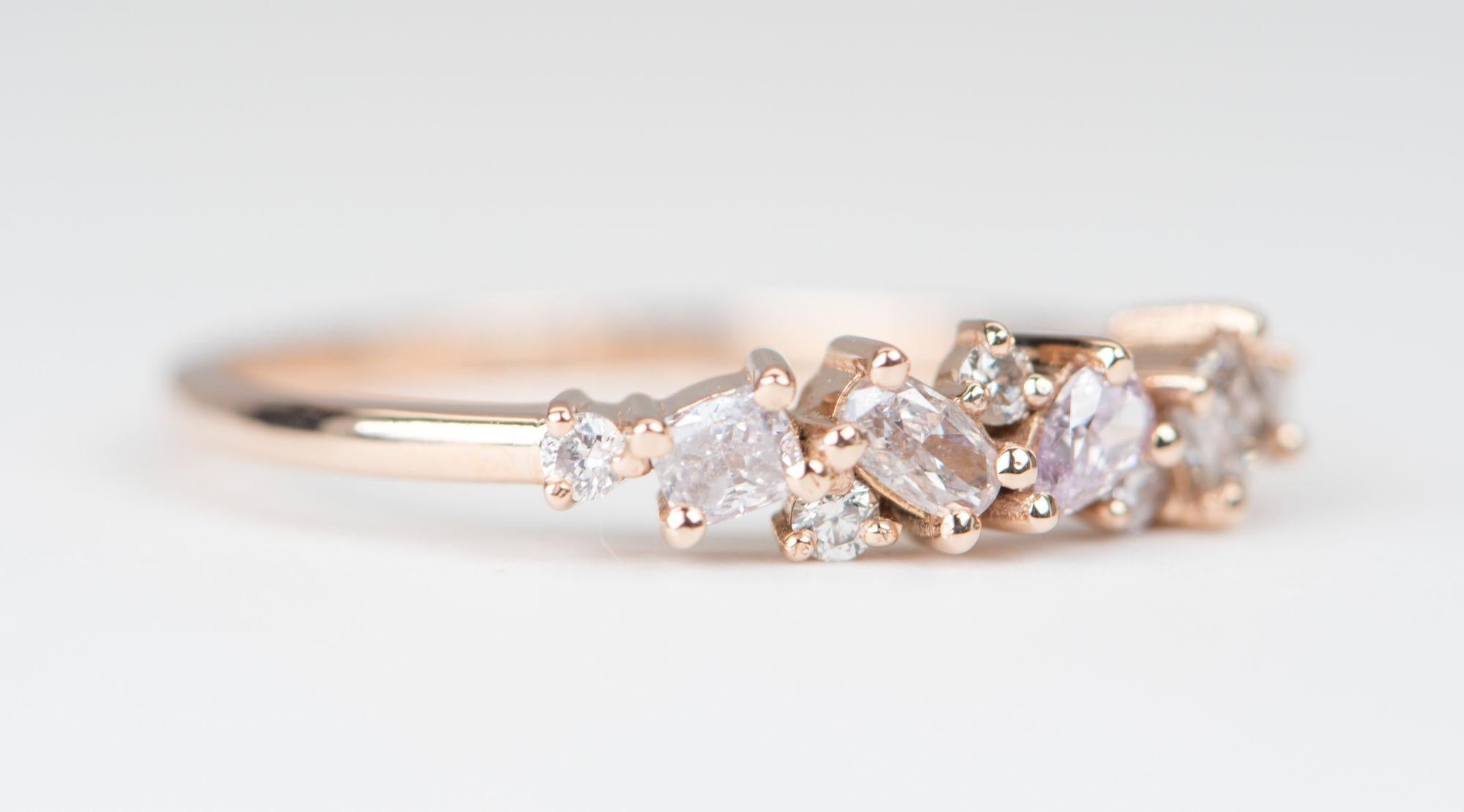 ♥ Natural Pink Diamond Cluster 14K Rose Gold Wedding Band
♥ Solid 14k rose gold ring set with beautiful mix-shaped pink diamonds
♥ Gorgeous light pink color!
♥ The item measures 4.04 mm in length, 15.7 mm in width, and stands 3.3 mm from the