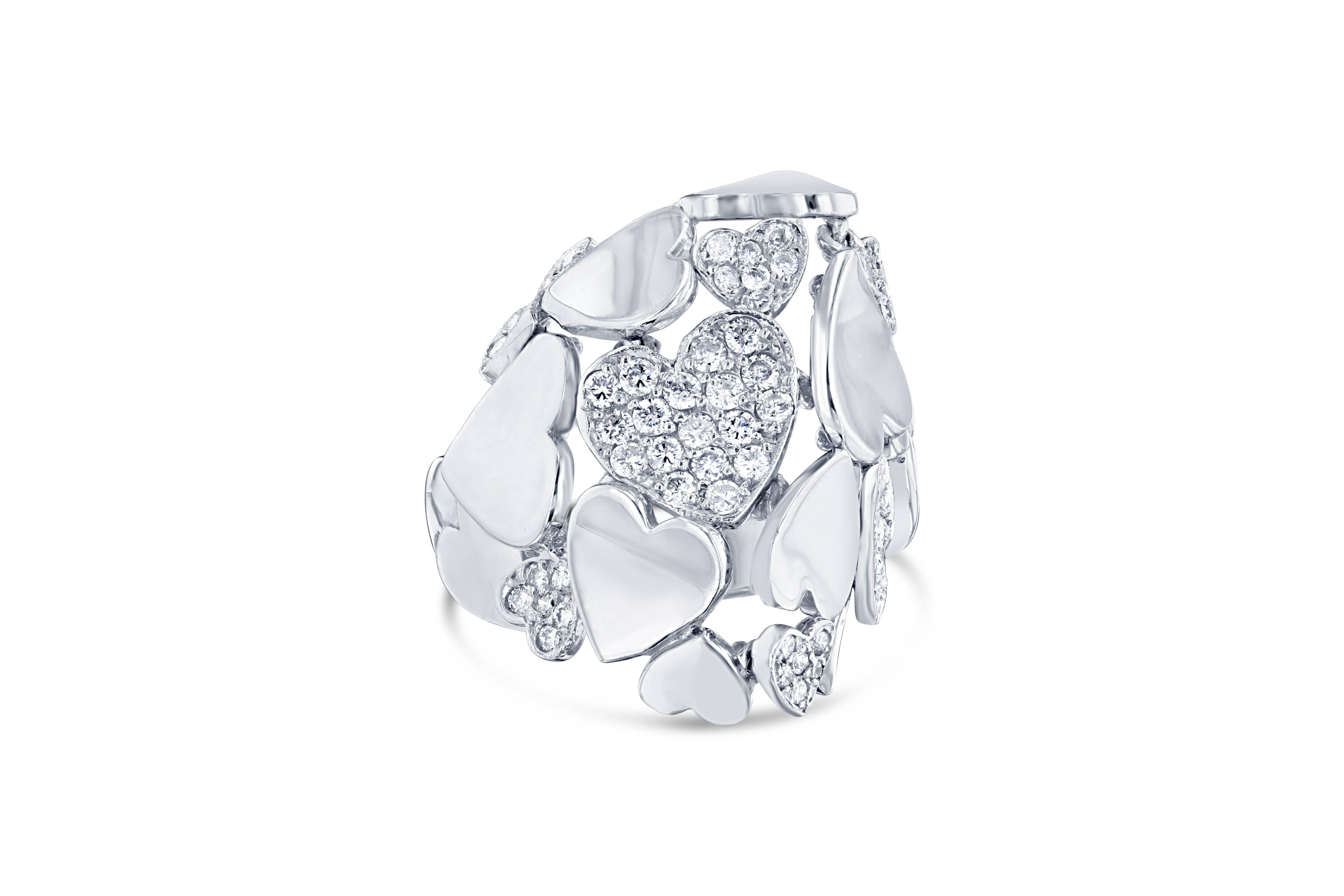 Natural Modern 0.43 Carat Round Cut Diamond Cocktail Ring 14 Karat White Gold

There are 38 Round Cut Diamonds that weigh 0.43 carat.  The Clarity and Color is: VS2 and G.  It is 14 Karat White Gold and weighs approximately 8.3 grams.  The ring is