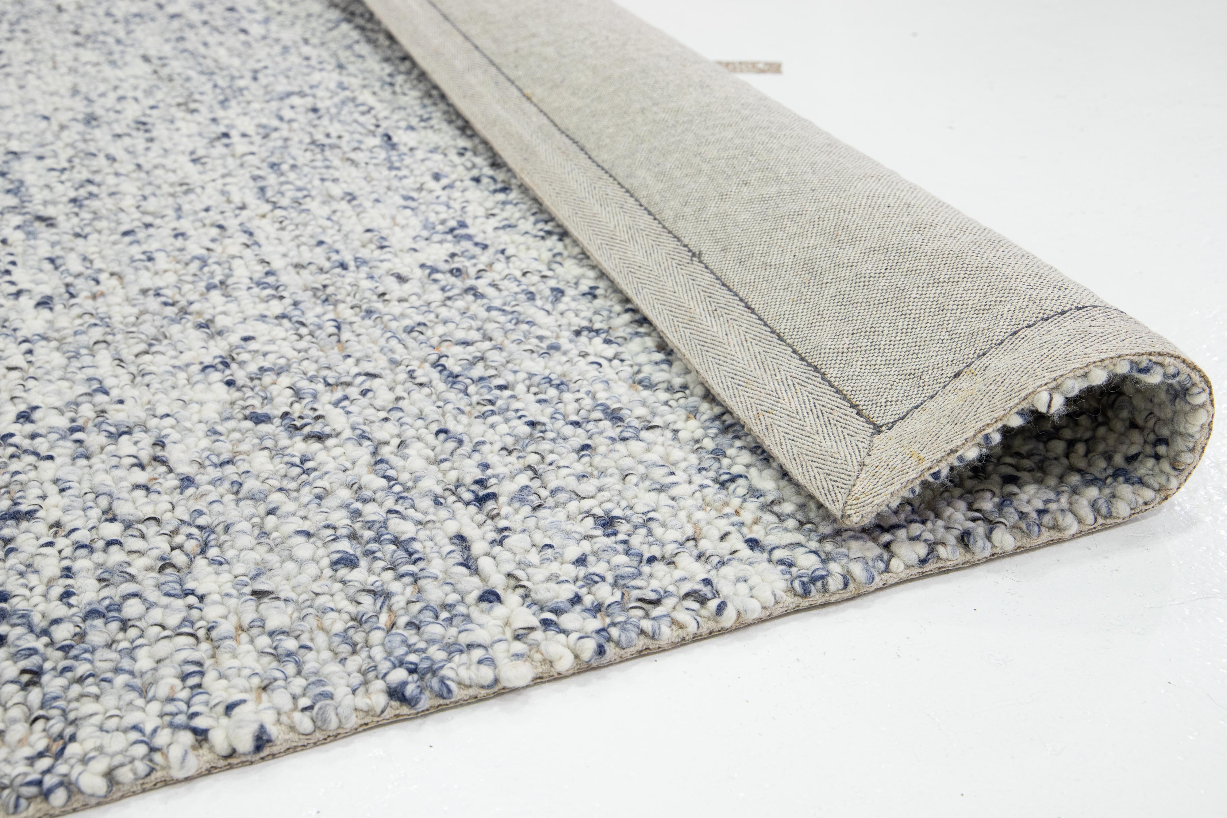 Hand-Woven Natural Modern Felted Wool Rug Handmade In Ivory and Blue by Apadana For Sale