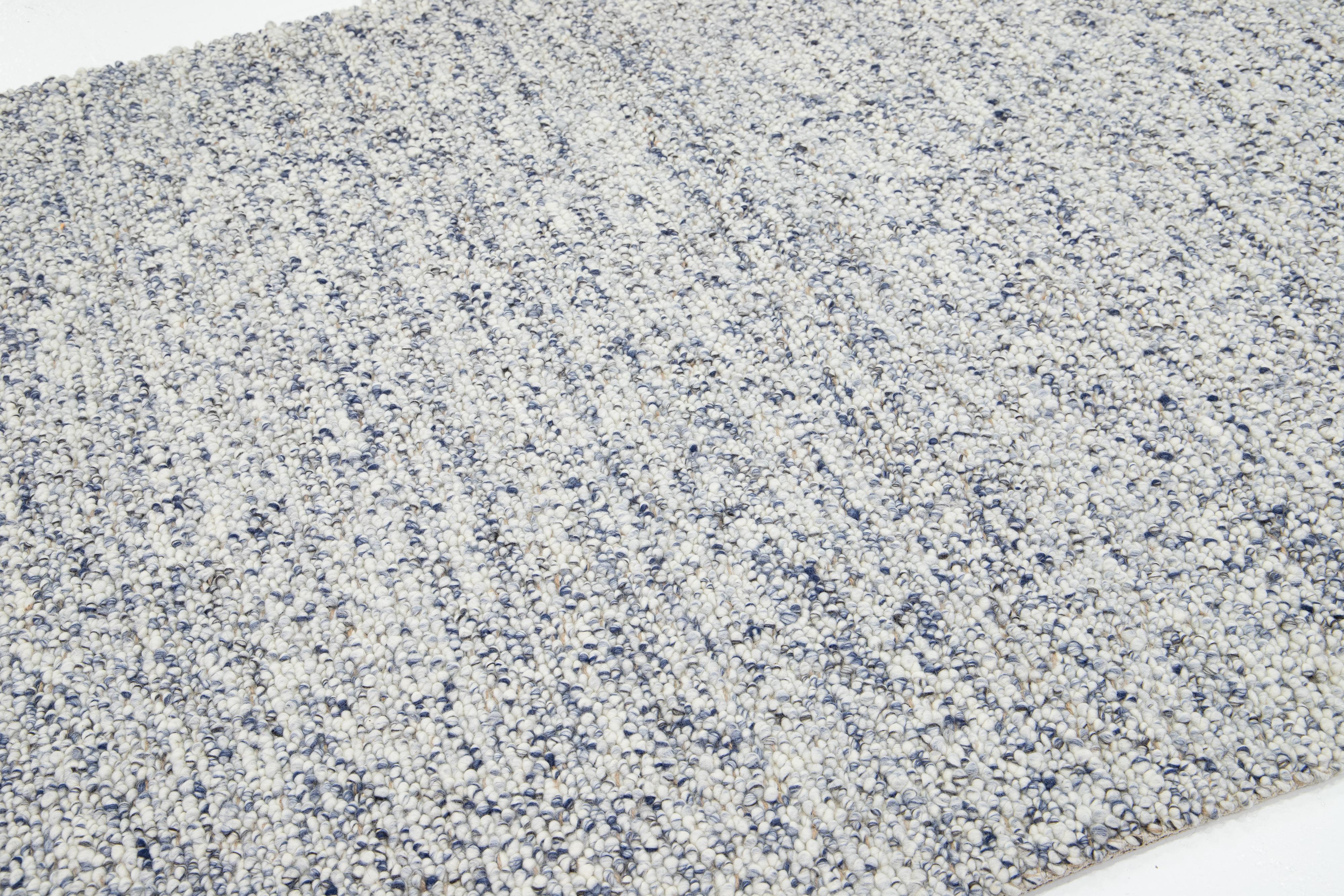 Natural Modern Felted Wool Rug Handmade In Ivory and Blue by Apadana In New Condition For Sale In Norwalk, CT