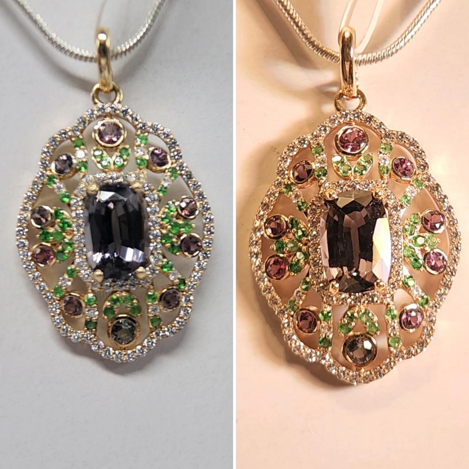 Brilliant Montana Sapphire - Spinal - Diamond Pendent, 
the Montana sapphires are rare and untreated.
All Natural stones.  
Diamonds is 0.56 carat and GH-VVS quality.
Center stone is Spinal and unheated 2.61  carat.
Round Montana sapphire surround