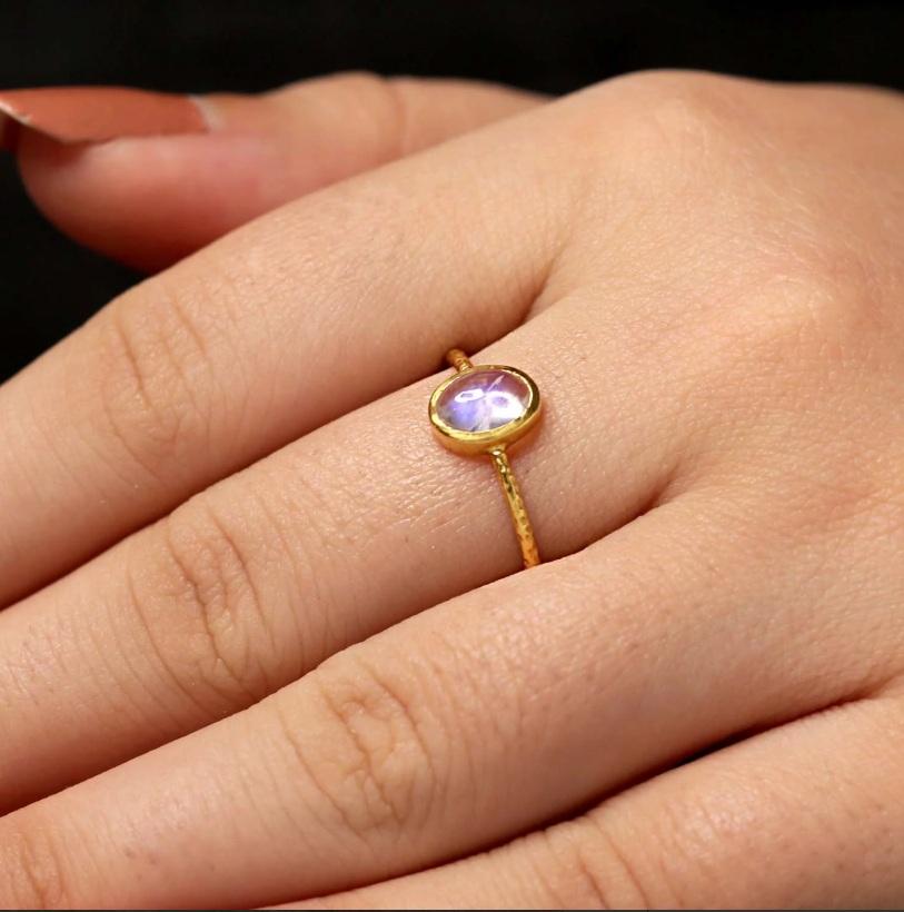This ring is made of 18K yellow gold and features an rainbow moonstone gemstone. It is a beautiful and unique piece of jewelry that would make a great addition to any collection.

Specifications

Dimensions: Ring Size-7.5, Top-8*6 mm
Gross Weight: