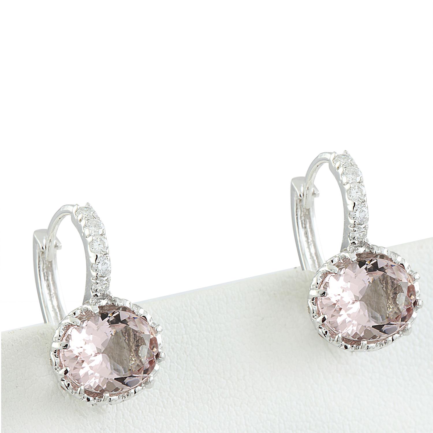 Introducing a mesmerizing pair of earrings that exude elegance and sophistication - the 3.65 Carat Natural Morganite 14 Karat Solid White Gold Diamond Earrings. Crafted to perfection these earrings are a true statement of luxury.

These earrings