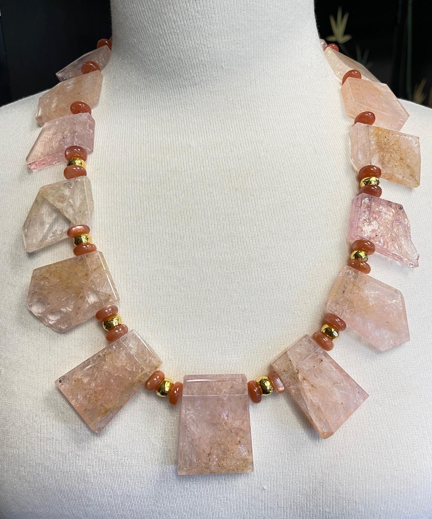 This stunning statement necklace features gorgeous natural morganite tile beads in a lovely array of pink champagne colors! The gemstone tiles are accentuated by mesmerizing natural characteristics that add beauty and originality to each polished