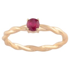 Anello con rubino naturale del Mozambico 0,3 carati in oro giallo 9K