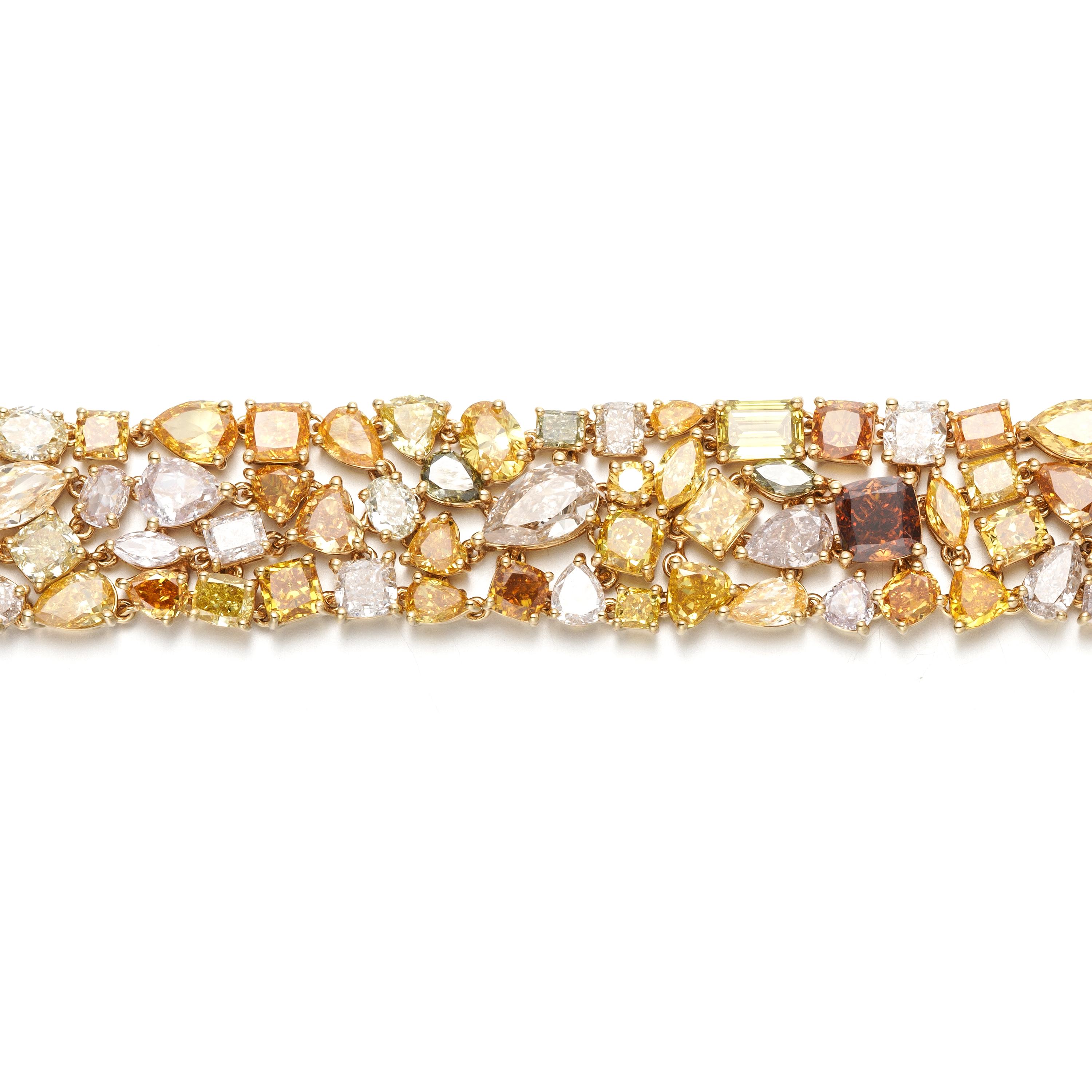 Contemporary Natural Multi Fancy colour and Multi shaped diamond link bracelet in 18KT Gold For Sale