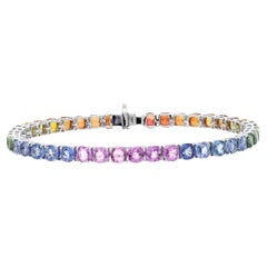 Natural multi sapphire 15.63cts tennis bracelet in 18k gold