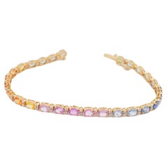 Pulsera de zafiro múltiple natural 6,98cts, diamante 0,36cts en oro de 18k
