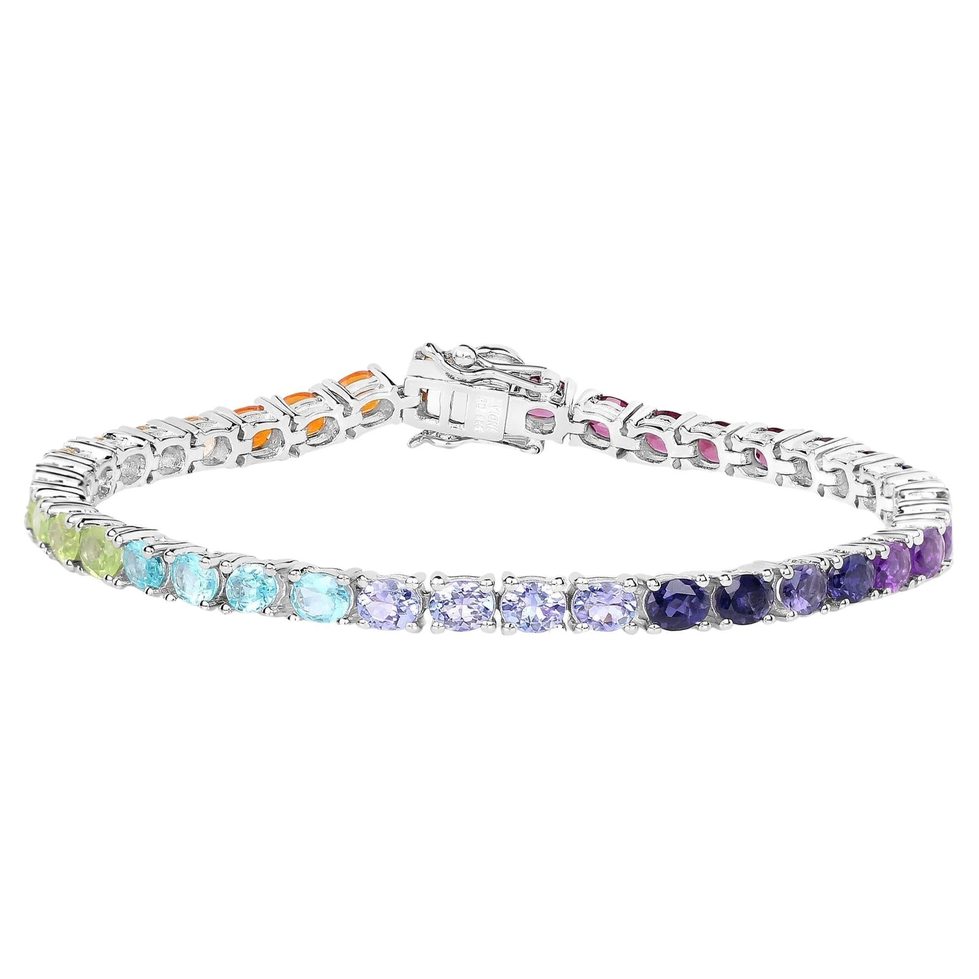 It comes with the appraisal by GIA GG/AJP
Natural Stones: Amethyst, Peridot, Citrine, Tanzanite, Garnet, Rhodolite Garnet, Apatite, Opal
Number Of Stones: 35
Cut = Oval
Metal: Sterling Silver
Rhodium Plated
Bracelet Size: 7  Inches