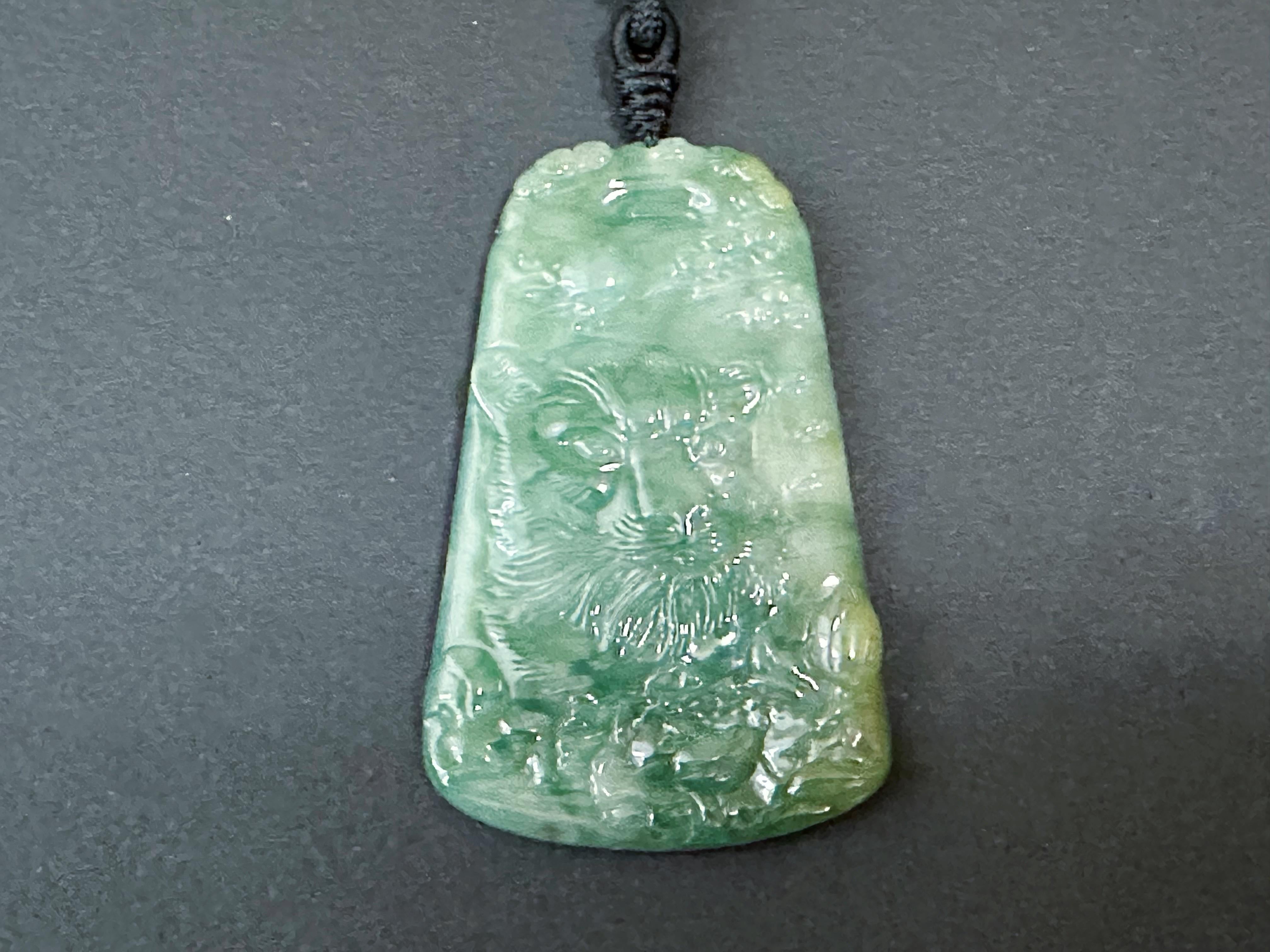 Women's or Men's Natural Myanmar Hand Carved Teal Green Icy Type Tiger Jadeite Pendant For Sale
