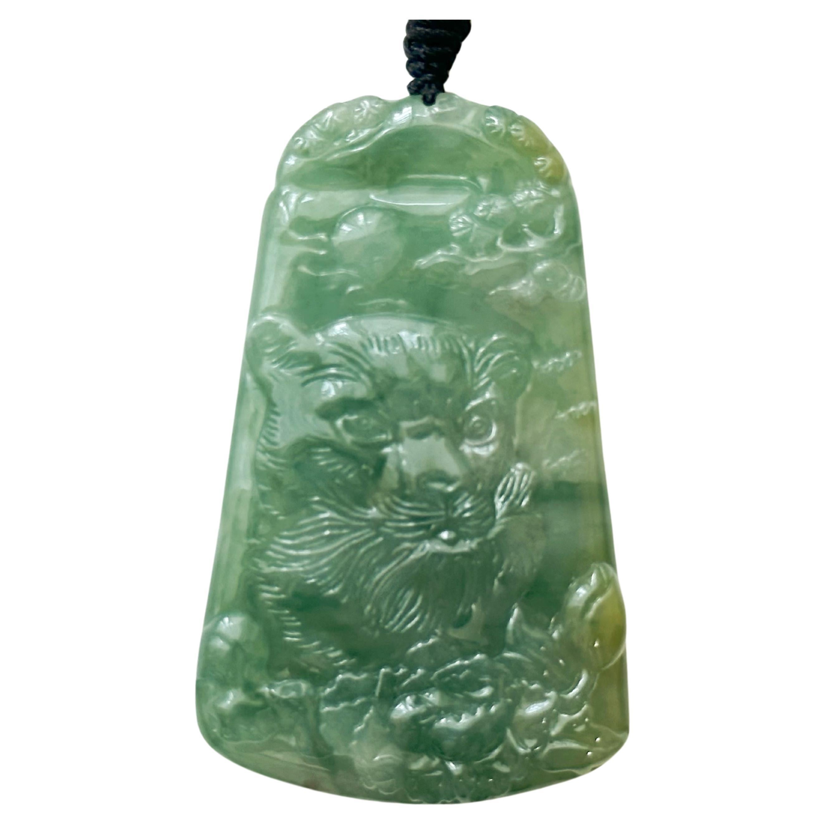Natural Myanmar Hand Carved Teal Green Icy Type Tiger Jadeite Pendant For Sale