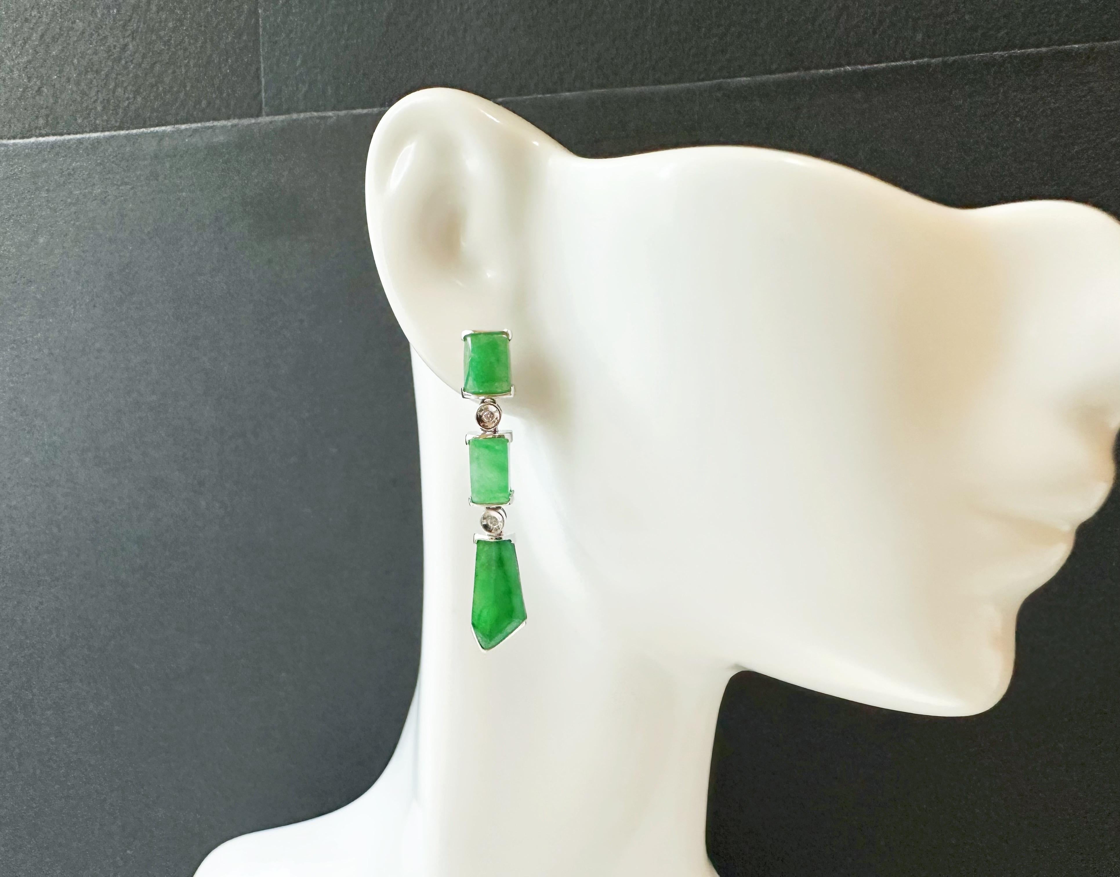 Discover the allure of our Natural Myanmar Icy Type Vivid Green Asymmetric Jade Earrings, a stunning blend of artistry and sophistication. Crafted from exquisite 100% untreated jadeite, these earrings showcase the captivating icy vivid green colour,