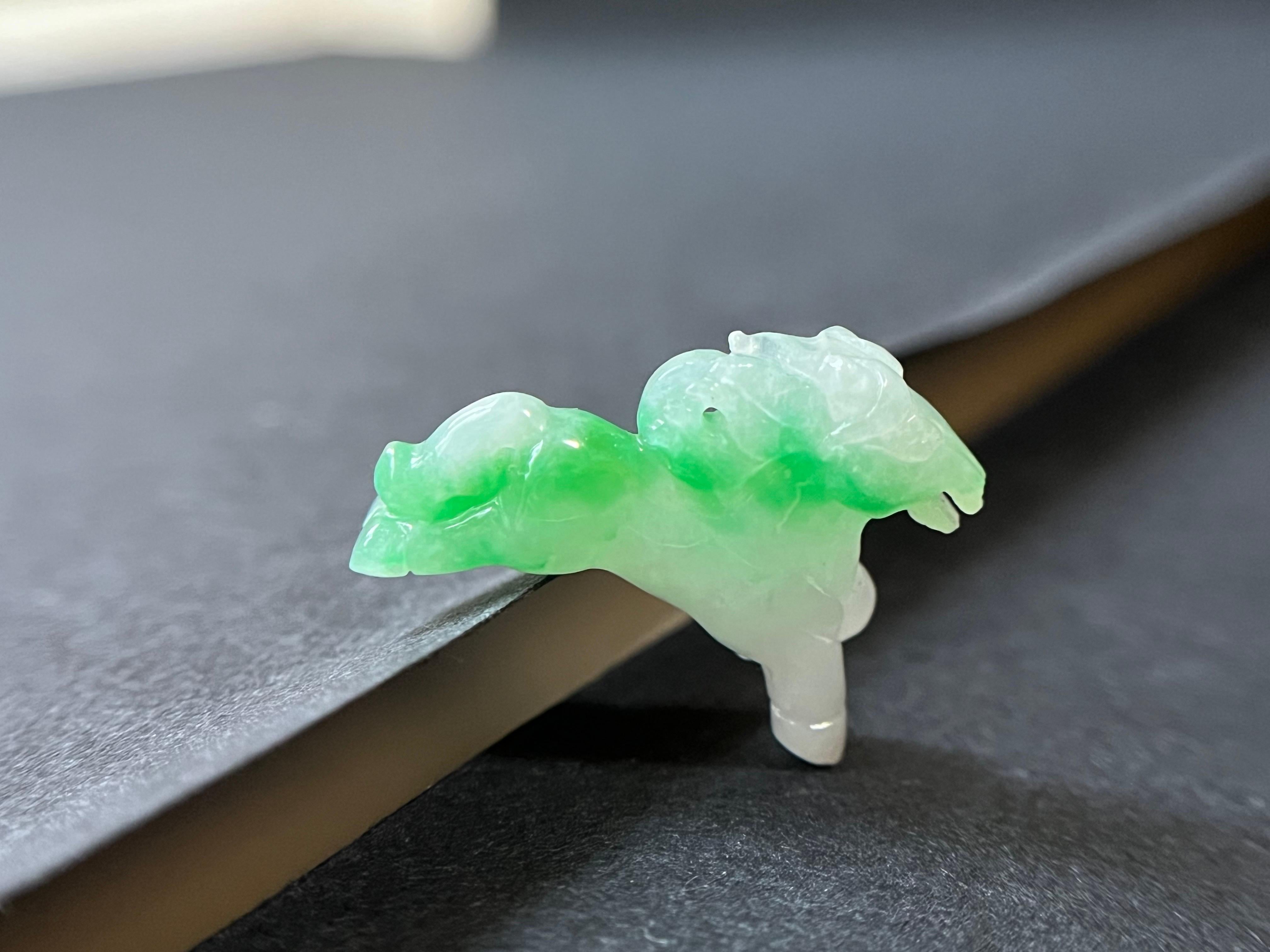 Introducing a one-of-a-kind jadeite horse, expertly carved from the finest 100% natural, untreated Type-A Myanmar jadeite. This magnificent piece features a beautifully smooth texture, showcasing the stunning beauty gifted by Mother Nature.

With