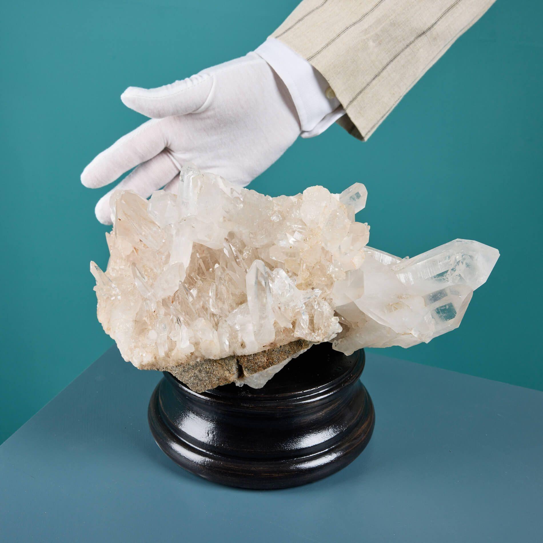 A natural quartz crystal specimen originating from Madagascar, presented on one of our museum-quality painted plaster bases.

Known for being one of the most abundant and versatile gemstones, quartz is celebrated for its range of colours,