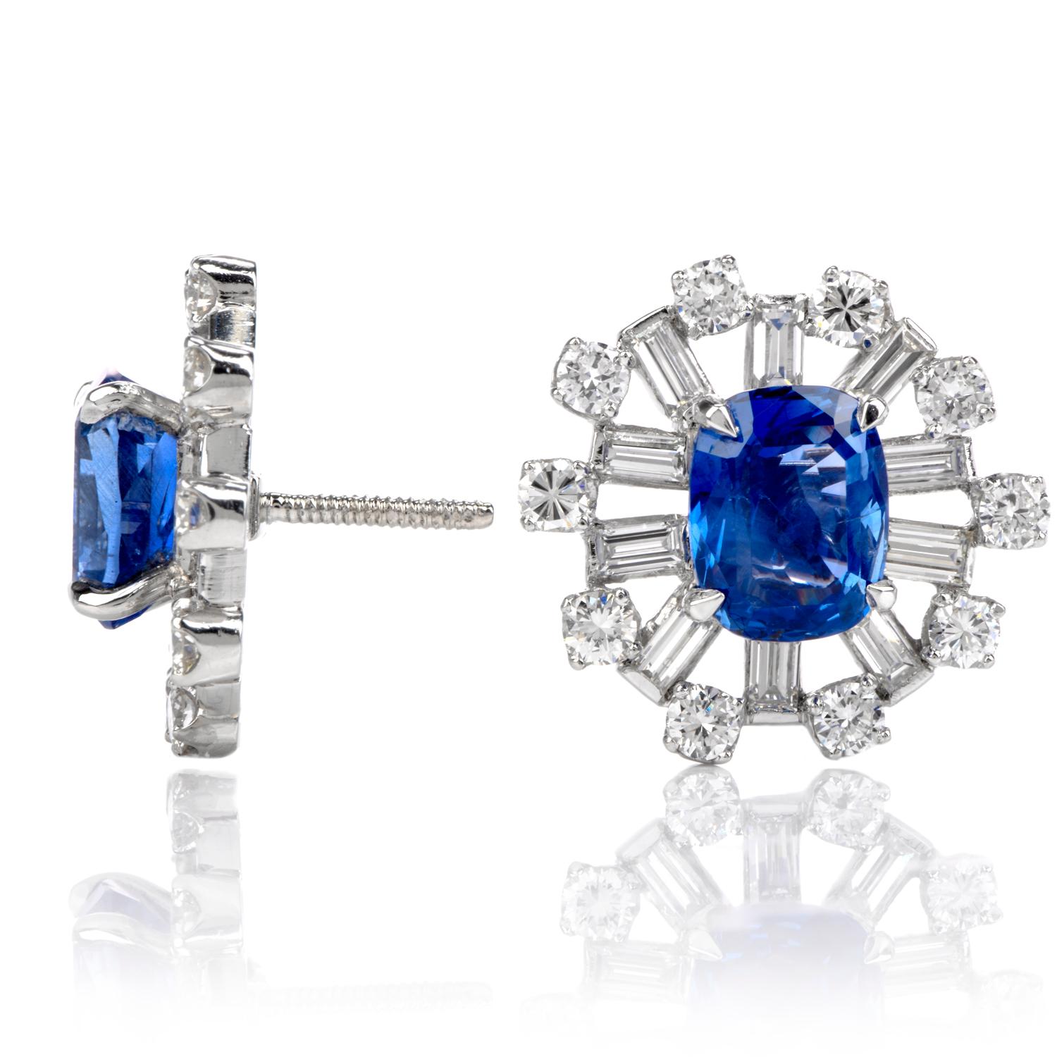These stunning sapphire and diamond earrings are handcrafted in solid platinum, weighing 15.0 grams and measuring 19mm wide. Displaying a pair of centered GIA lab reported natural, no heat, Cylon blue sapphires, one weighing 4.74 carats and