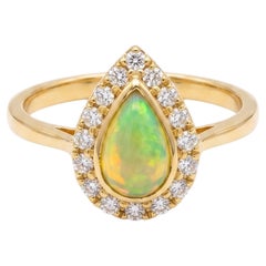 Natural Opal 0.90cts & Diamond 0.20cts Ring in 18k Gold