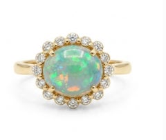 Ring aus 18-karätigem Gold mit einem natürlichen Opal (1,05 Karat) und Diamanten (0,15 Karat)