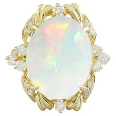Anello con diamante e opale naturale in oro giallo 14 carati