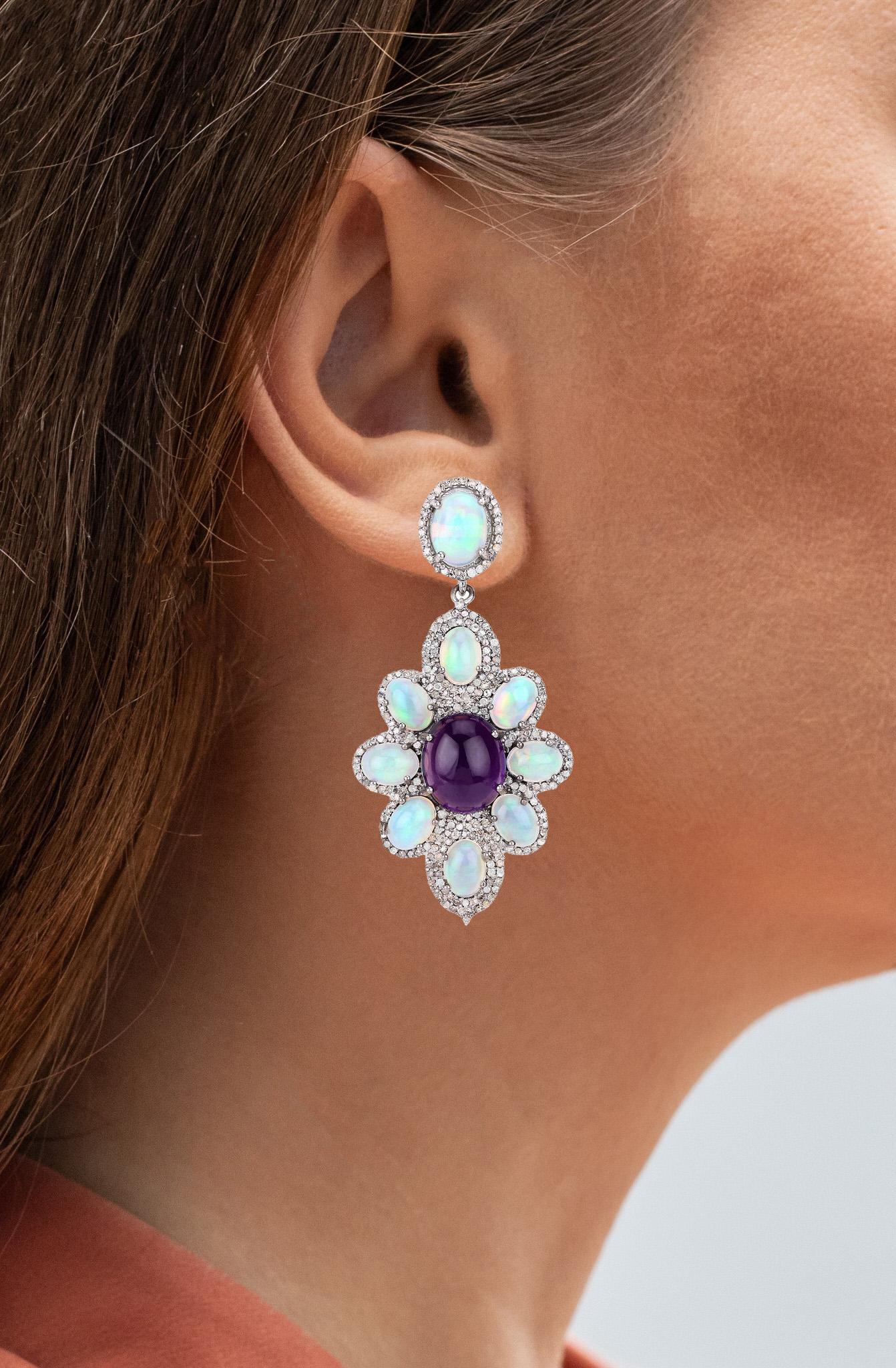 It comes with the appraisal by GIA GG/AJP
All Gemstones are Natural 
2 Amethysts = 12 Carats
18 Opals = 11.20 Carats
478 Diamonds = 2.30 Carats
Metal: Sterling Silver
Post With Friction Back
Length: 54 mm