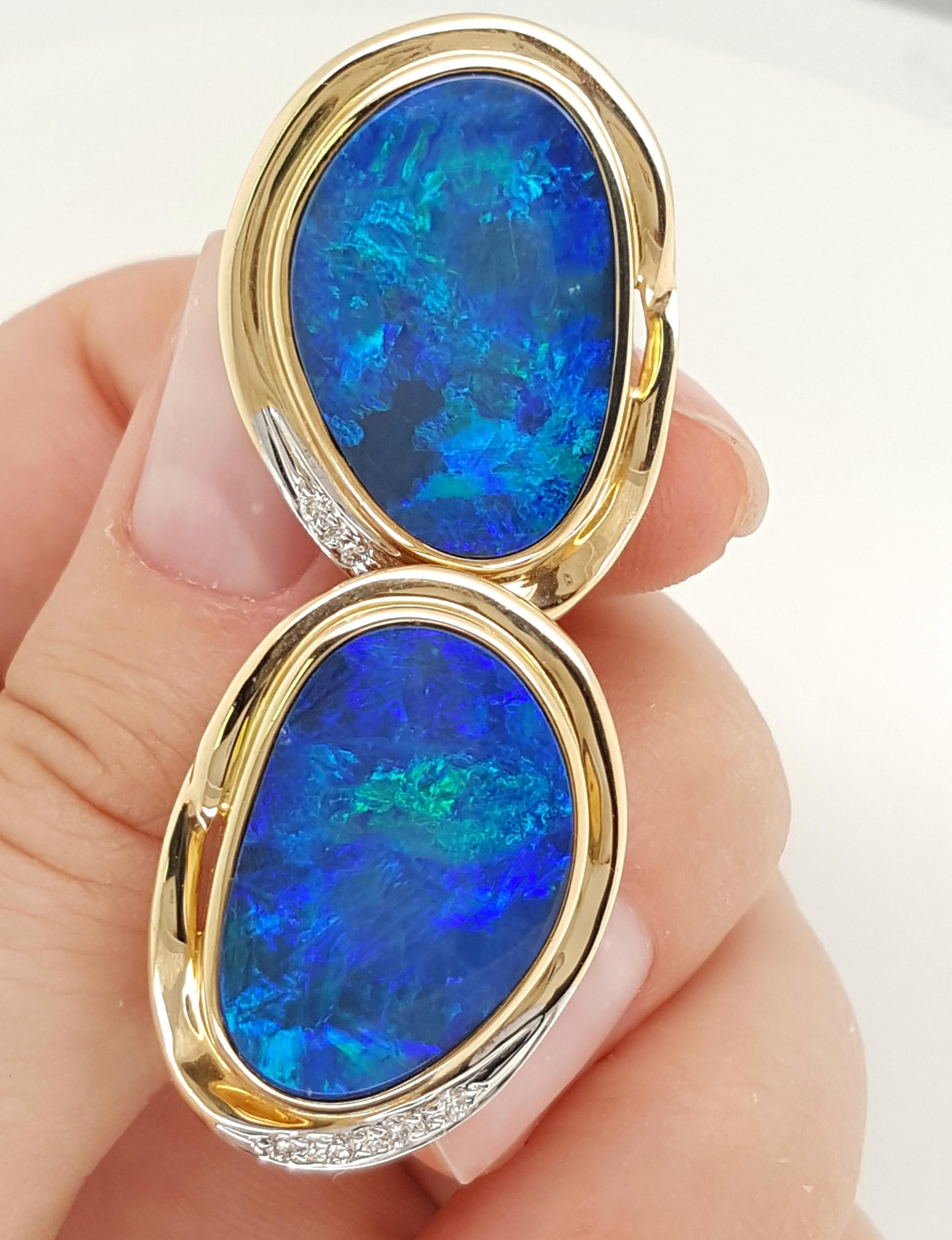 Natural Opal and diamond Stud Earrings Encased in 14 Karat Yellow Gold Bezels In Excellent Condition In Addison, TX
