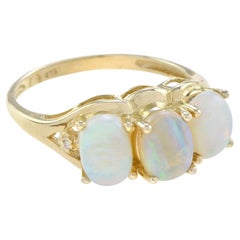 Natural Opal and Diamond Three Stone Ring in 9K Yellow Gold