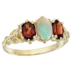 Natural Opal and Garnet Vintage Style Three Stone Ring in Solid 9K Yellow Gold