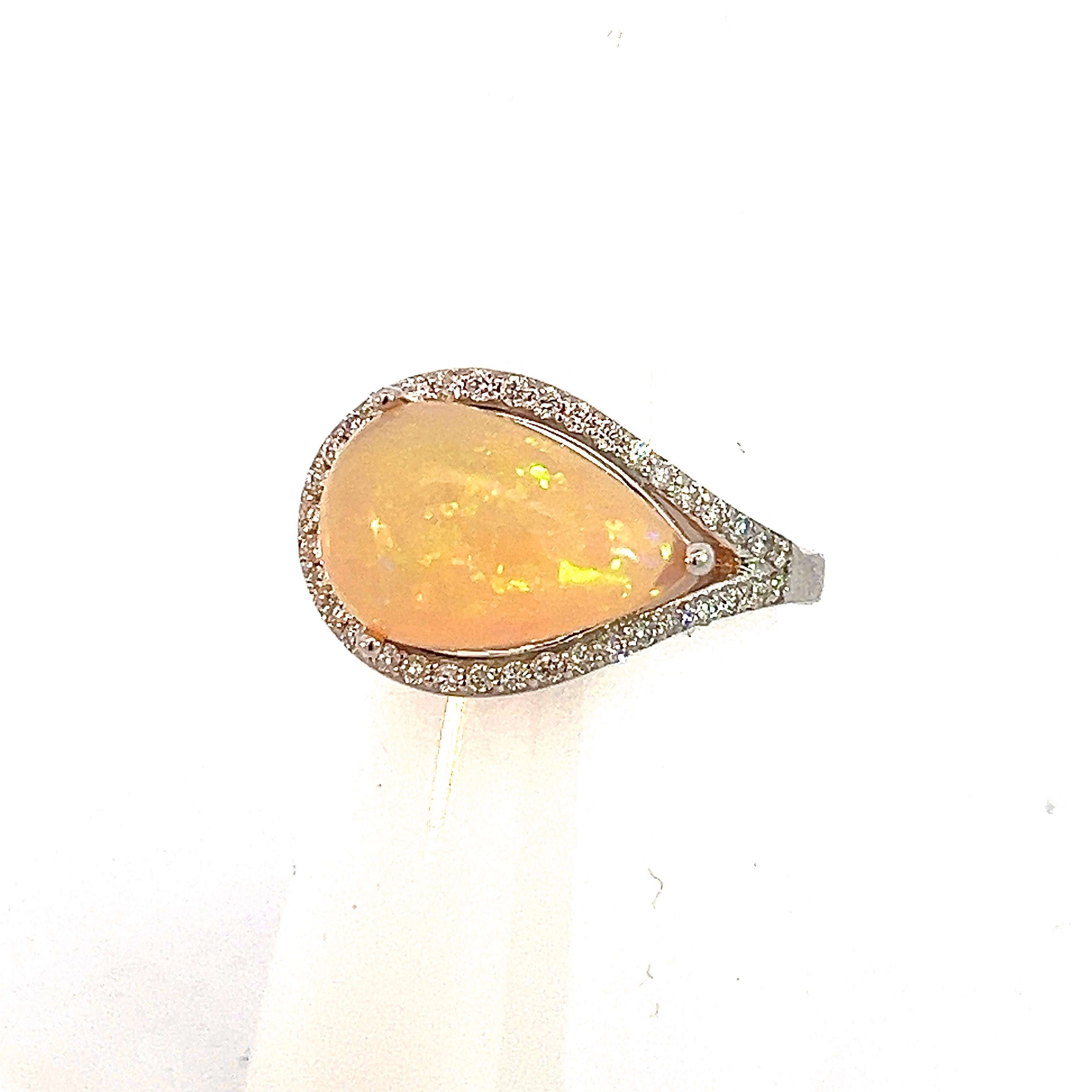 Natural Fine Quality Opal Diamond Ring 6.75 14k W Gold 4 TCW Certified $4,950 310548

This is a Unique Custom Made Glamorous Piece of Jewelry!

Nothing says, “I Love you” more than Diamonds and Pearls!

This Opal ring has been Certified, Inspected,