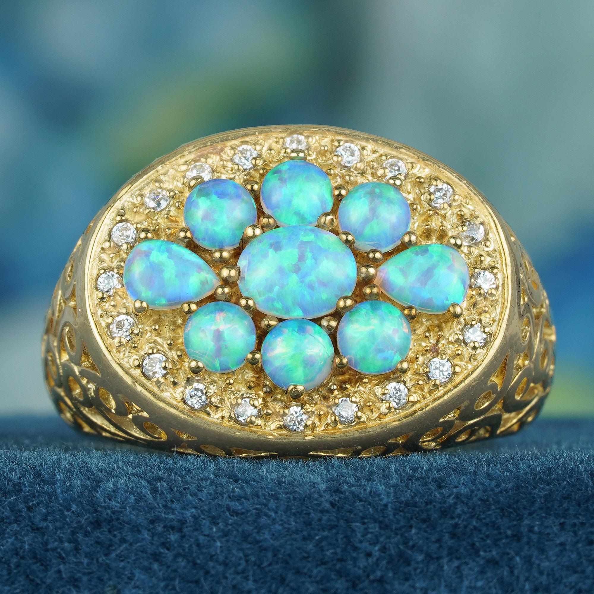 In der Mitte des Vintage-Rings befindet sich eine Gruppe natürlicher Opale, von denen jeder eine faszinierende weiße Farbe aufweist, die die Eleganz des Schmuckstücks unterstreicht. Um die Opale herum sind Diamanten eingebettet, die dem Ring eine